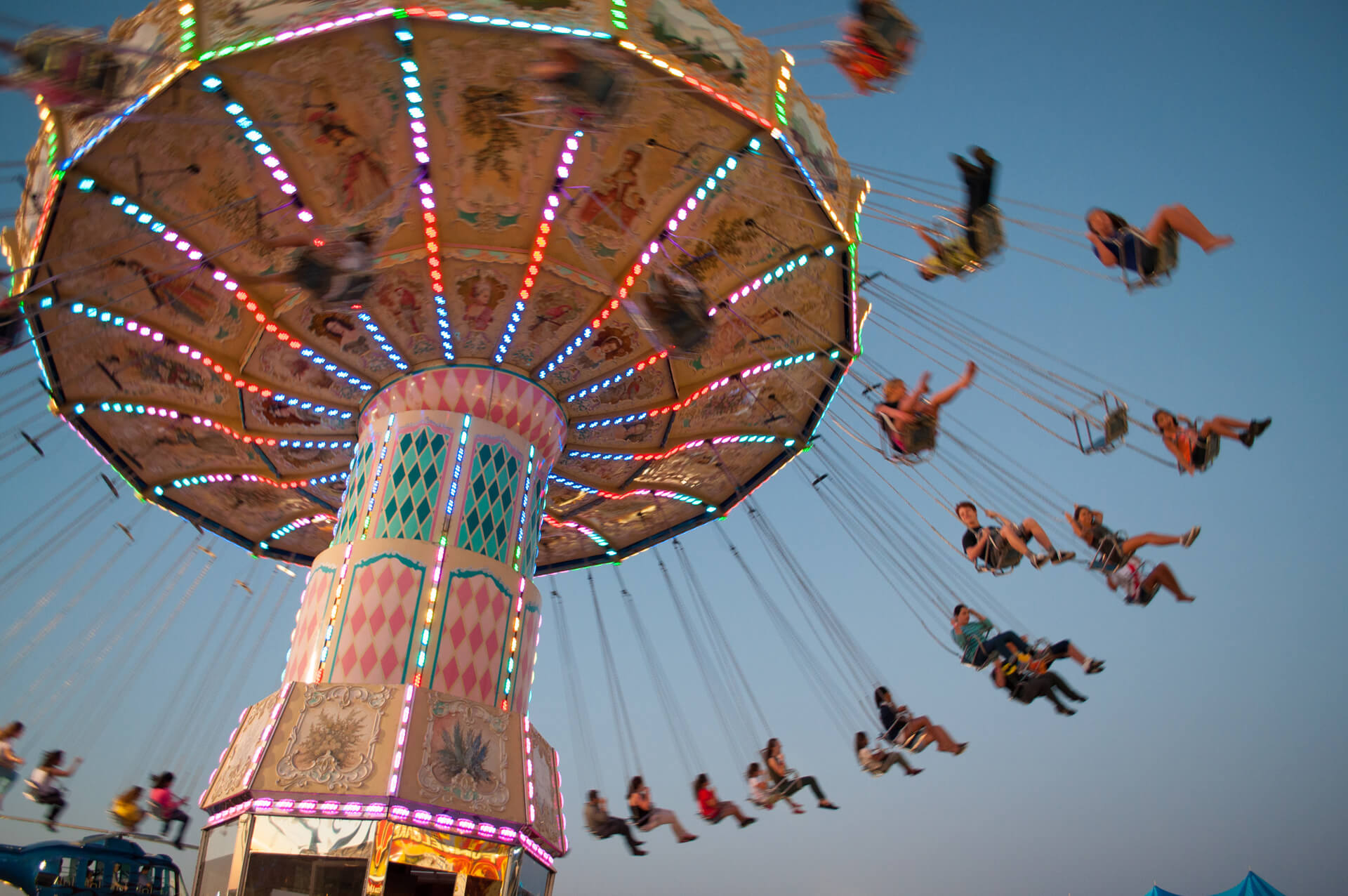 Swing ride at fair image